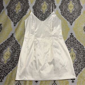 Fashion Nova white satin mini dress BNWT
Size medium